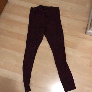 Maroon and black skinny jeans
